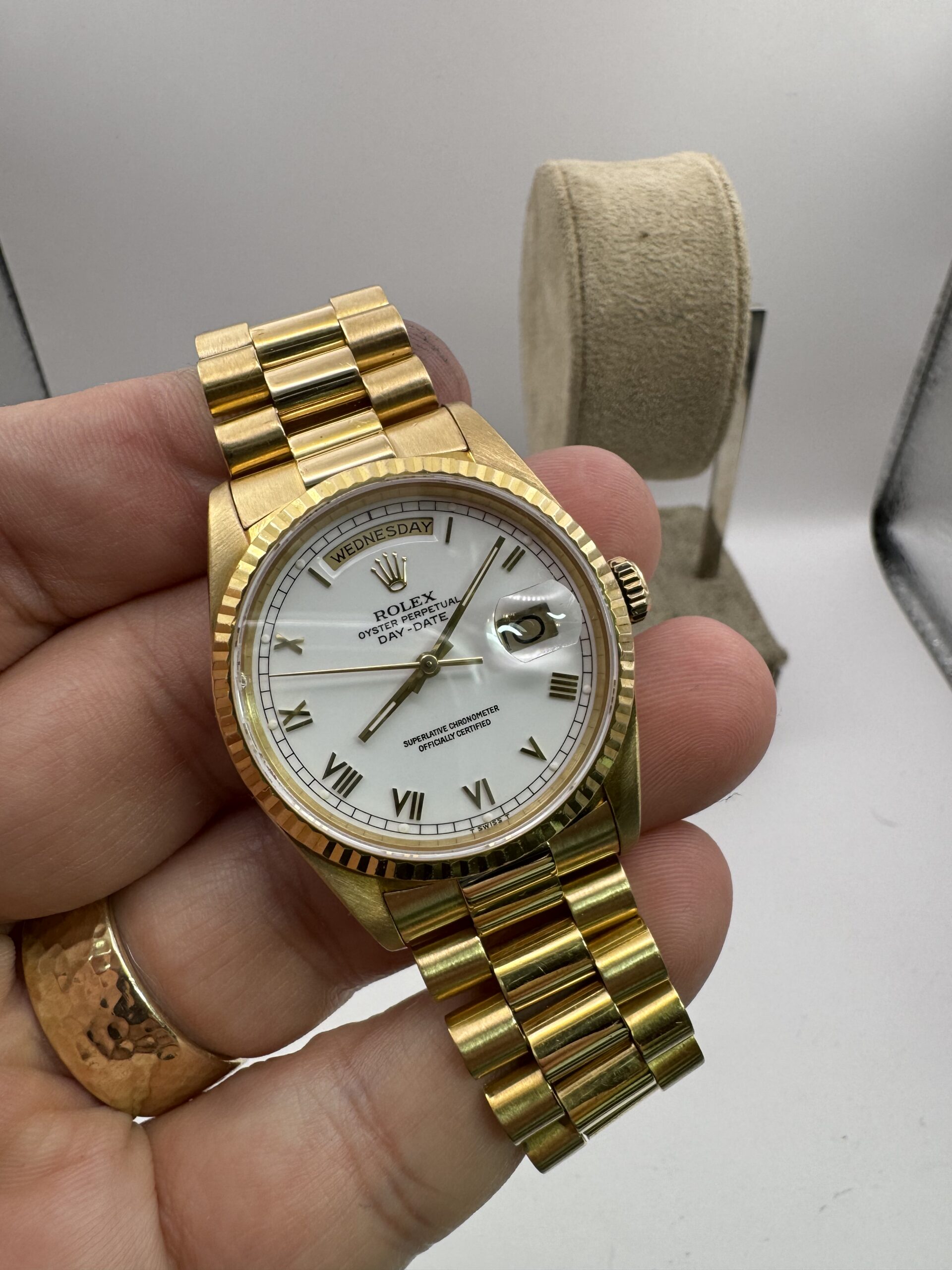 Gold Rolex Day-Date watch